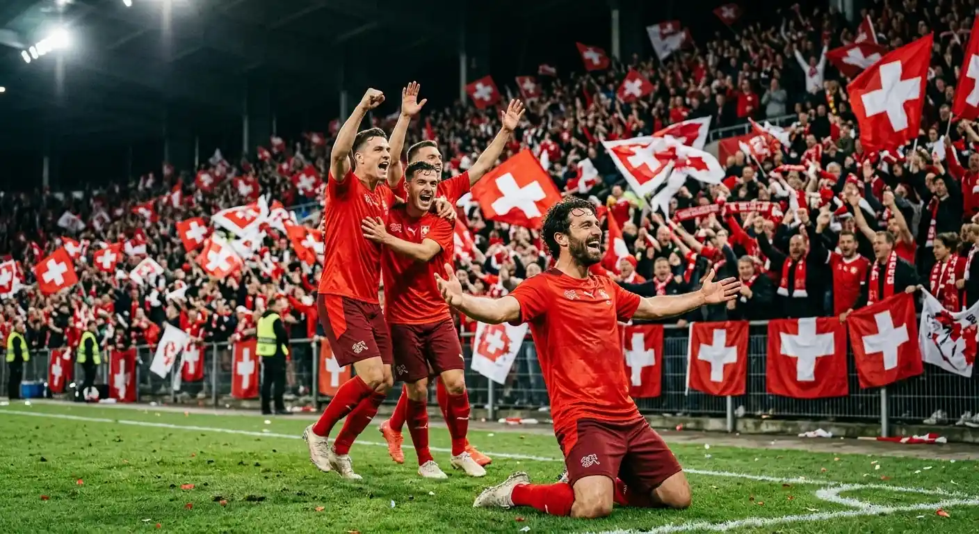 Schweizer Nationalspieler feiern ausgelassen vor der eigenen Fankurve nach dem Erreichen des Viertelfinals
